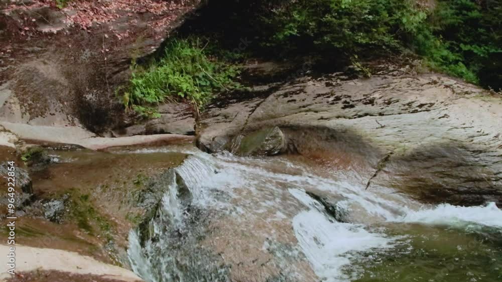 waterfall in the forest | riverflow waterfall in the forest | riverflow