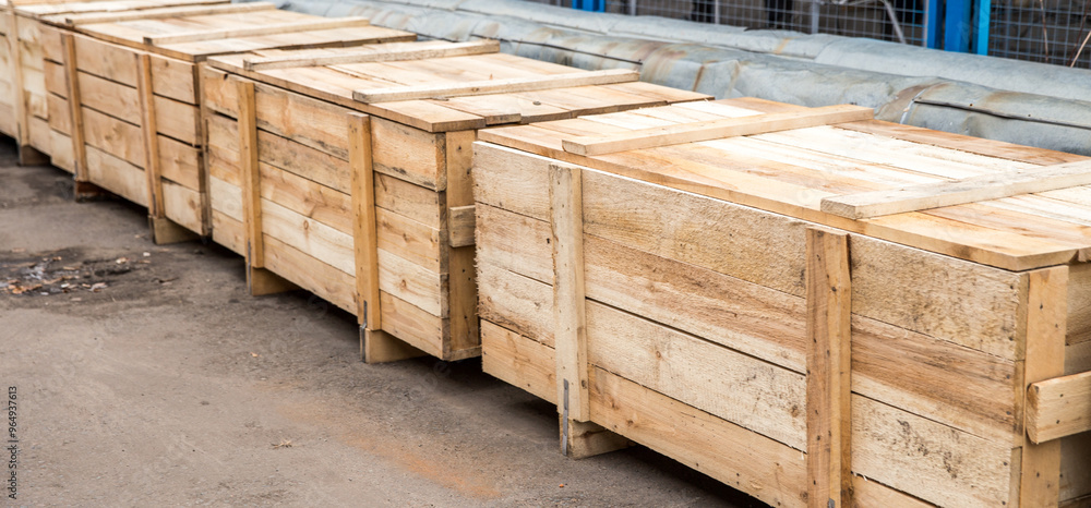 Many big wooden cargo containers standing outdoor Many big wooden cargo containers standing outdoor