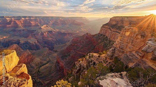 A breathtaking view of the Grand Canyon at sunset, showcasing its vastness and colorful rock formations.