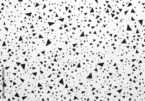 Minimalist Seamless Pattern of Small Black Triangles on a White Background