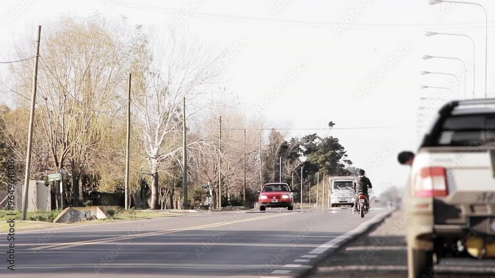 Vehicles Driving on Rural Road Outside Pergamino, Buenos Aires Province, Argentina