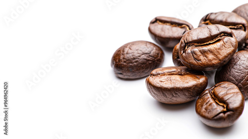 Isolated on a white background are roasted arabica coffee beans.