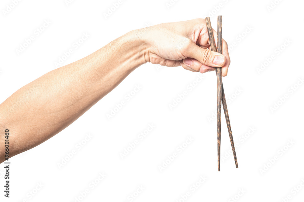 Male hand holding a wood chopstick isolated on white background. Male hand holding a wood chopstick isolated on white background.
