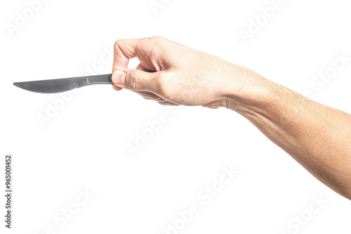 Male hand holding a black plastic cooking knife isolated on white background.