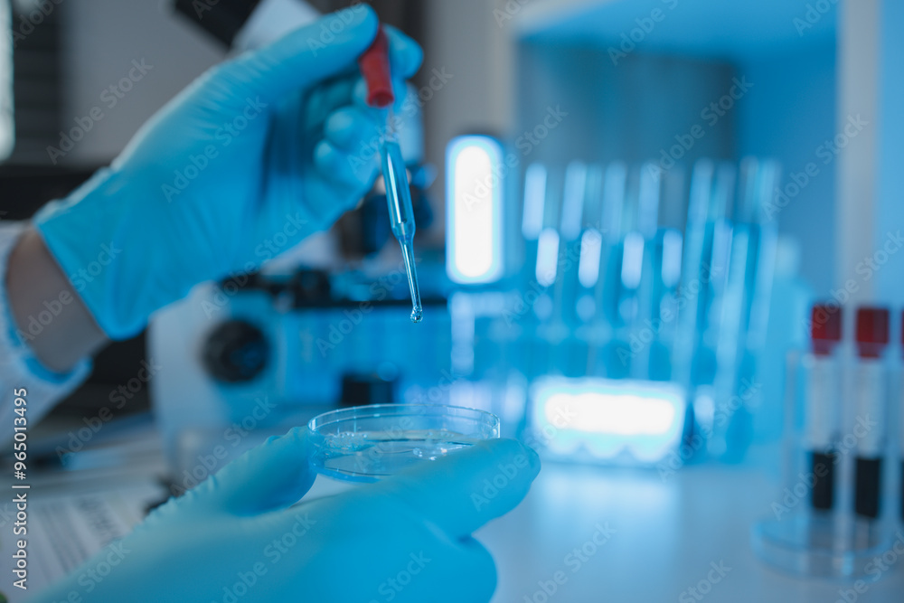 a researcher is conducting scientific experiments on a liquid substance, a scientist is using laboratory equipment to analyze a liquid sample, chemicals are tested in a lab a researcher is conducting scientific experiments on a liquid substance, a scientist is using laboratory equipment to analyze a liquid sample, chemicals are tested in a lab