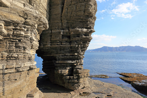 Geological stratum of sea rocks at Sangjogam County Park near Goseong-gun, South Korea  photo