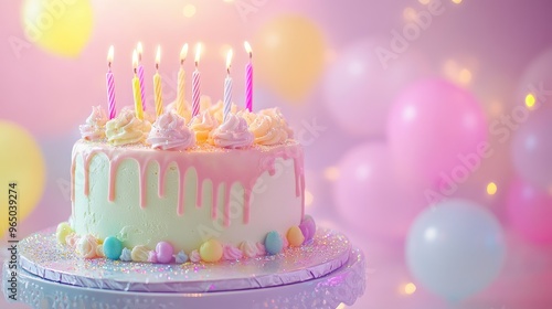 A birthday cake with pastel decorations and glitter candles, on a smooth, softly glowing background. No people. photo