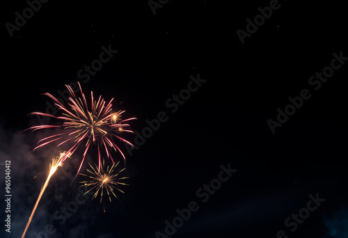 Festival fireworks frame Bright crackers lights in starry night sky with copy space