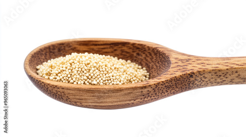 A close-up of a wooden spoon filled with tiny, light-colored seeds in a kitchen setting, showcasing natural food ingredients