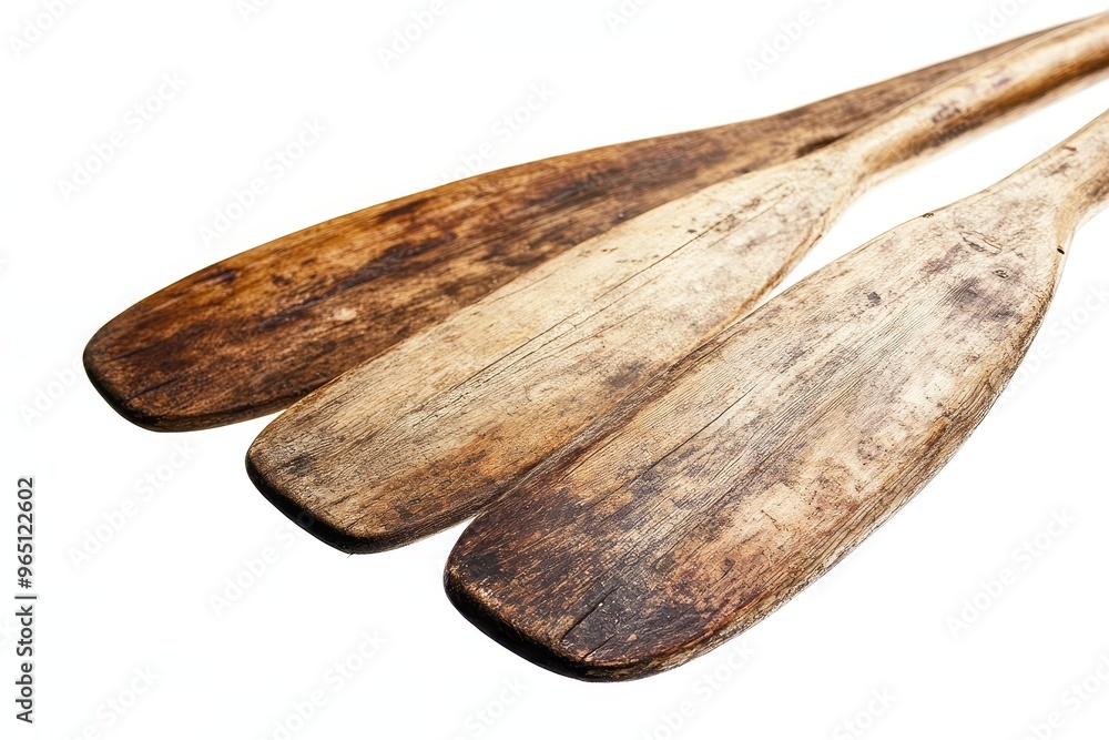 weathered wooden oars with stains and cracks on white background weathered wooden oars with stains and cracks on white background
