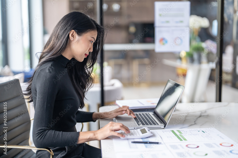 Beautiful confident asian business woman working with laptop Hands typing keyboard. Professional investor working new start up project. business planning in office. Technology business Beautiful confident asian business woman working with laptop Hands typing keyboard. Professional investor working new start up project. business planning in office. Technology business