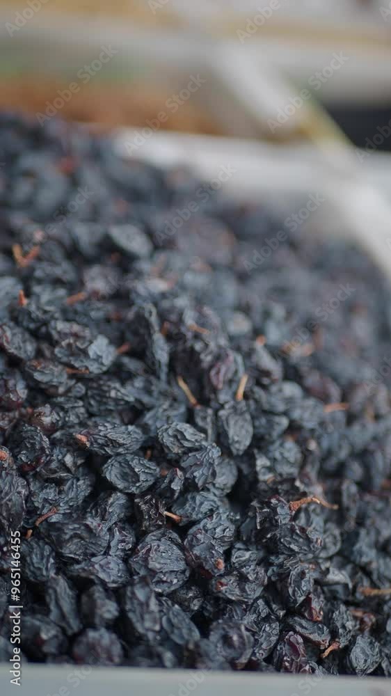 A CloseUp View of Dried Black Berries Displayed Beautifully at the Local Market A CloseUp View of Dried Black Berries Displayed Beautifully at the Local Market