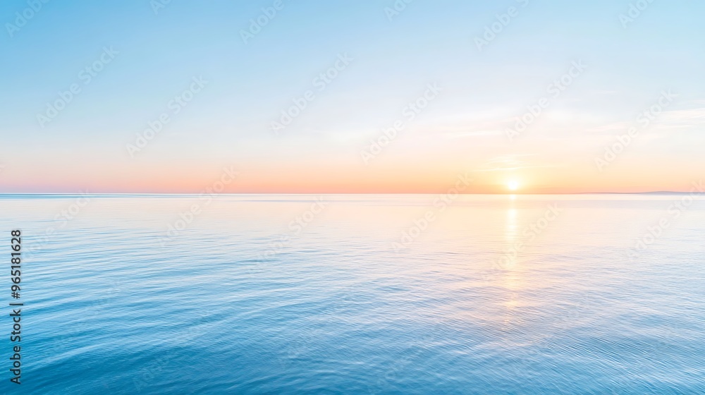 Obraz premium Sunrise over a calm ocean, symbolizing new beginnings and fresh starts