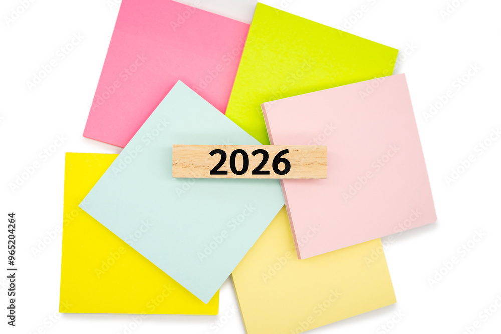 2026 text wooden block on colorful sticky note. 2026 new year idea concept. 2026 text wooden block on colorful sticky note. 2026 new year idea concept.