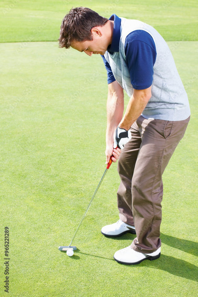 Fototapeta premium Man, putting and golf course for playing, club and outdoor fitness for competition or games. Male person, tournament and precision driver for practice match on turf, exercise and professional athlete