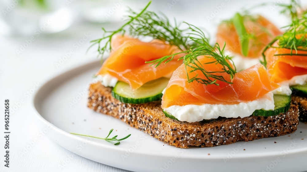 Smørrebrød isolated on a clean white background, emphasizing the layers and presentation of the Danish open-faced sandwiches. Smørrebrød isolated on a clean white background, emphasizing the layers and presentation of the Danish open-faced sandwiches.