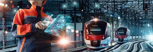 .Transport technology, Engineer using control panel Ui of virtual interface for analysis data systems electrics of track on train railway on networking connection, Modern Industrial and transportation