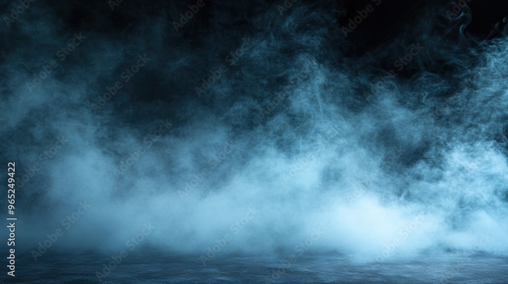 Fototapeta premium Mysterious blue smoke on dark background