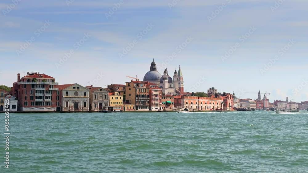 Venice landscape 4K video from boat. Sunny summer day in Venice, view to San Marco Square and other landmark buildings. Travel to Italy. Venice landscape 4K video from boat. Sunny summer day in Venice, view to San Marco Square and other landmark buildings. Travel to Italy.