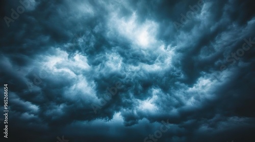 Dramatic storm clouds gathering in turbulent sky