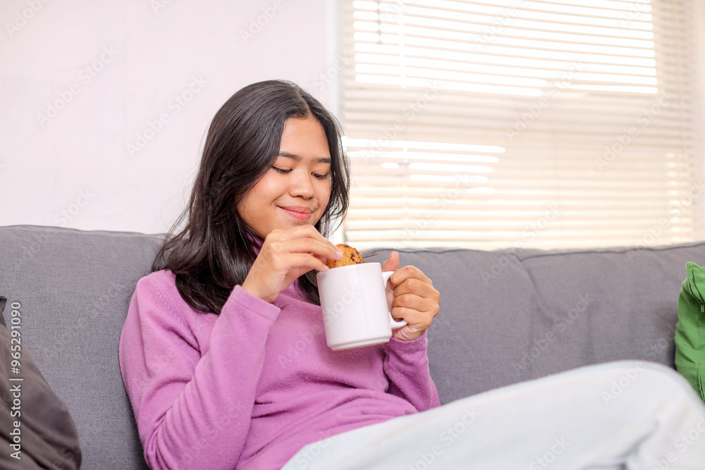 Morning Breakfast Food In Winter. Happy Young Asian Woman With Cup of Coffe Eating Cookie at Home
Morning Breakfast Food In Winter. Happy Young Asian Woman With Cup of Coffe Eating Cookie at Home