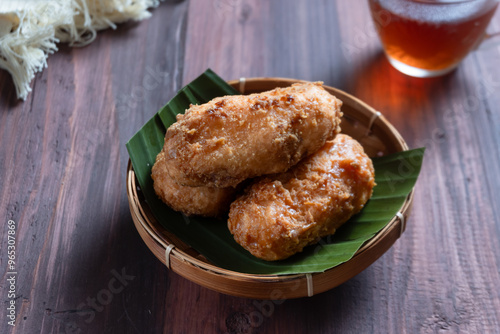 Kue Gemblong, Getas, Kemplang, Indonesian Traditional Snack made from Sticky Rice Coated with Sugar. Perfect for recipe, article, catalogue, commercial, or any cooking content. photo