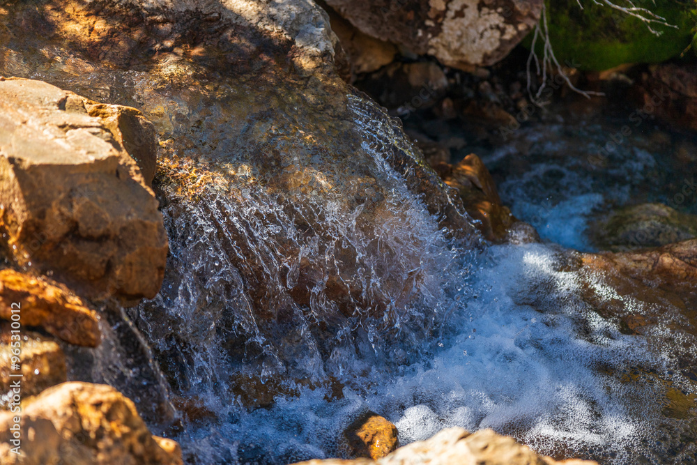 Fototapeta premium Stream waterfall close up in the early morning light