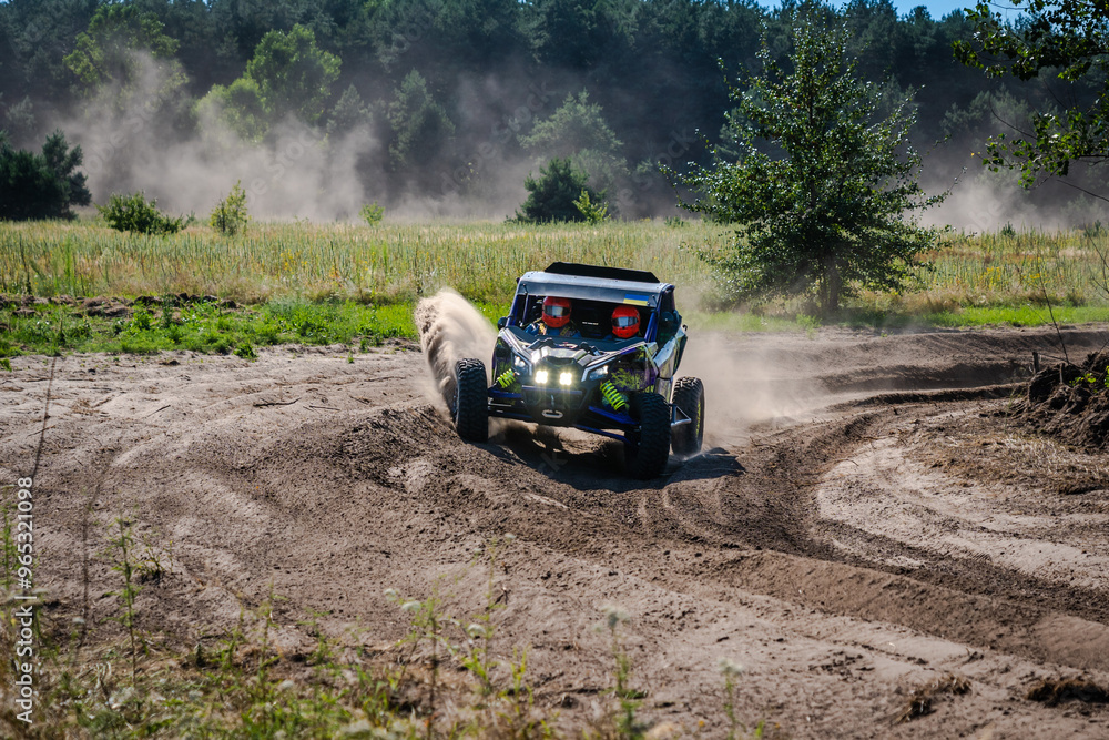 ATV, UTV, buggy, rally riding in dusty track. Amateur competitions ATV, UTV, buggy, rally riding in dusty track. Amateur competitions
