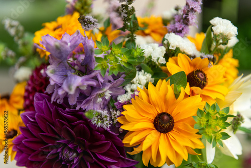 Summer bouquet. Beautiful multi colored fresh flower arrangement. Locally sourced flowers birthday bouquet close up. photo