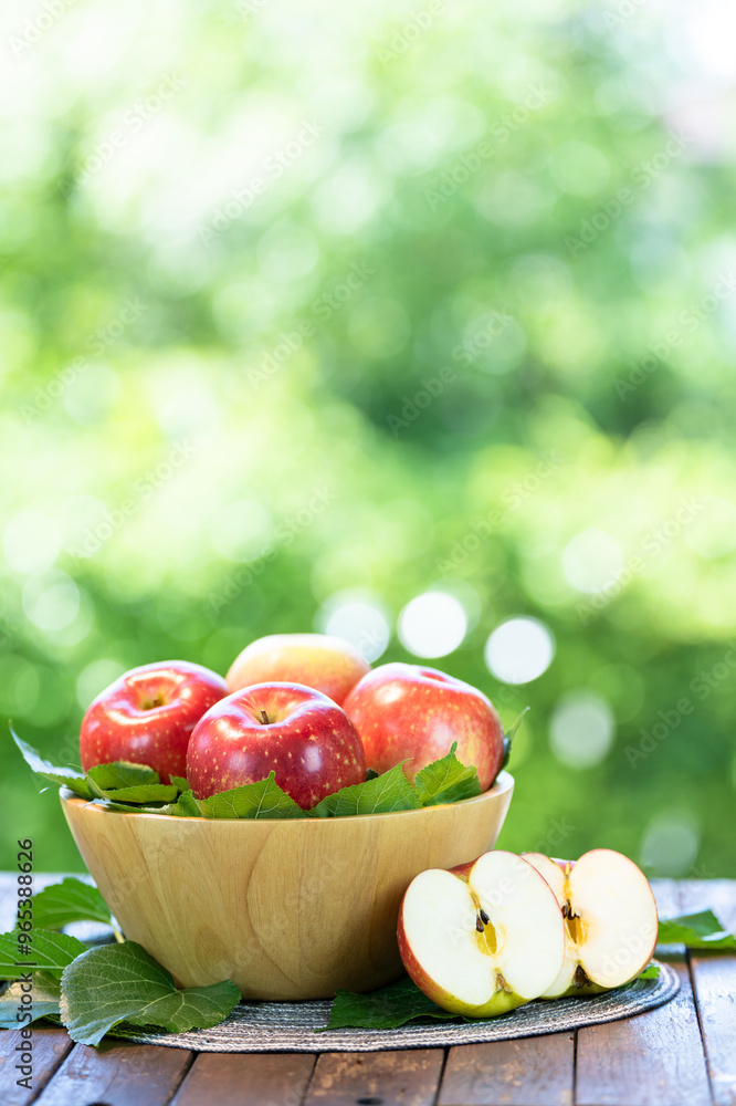 Red Japanese Apple in Wooden tray, Shinano Red and Sansa Apple on wooden background. Red Japanese Apple in Wooden tray, Shinano Red and Sansa Apple on wooden background.