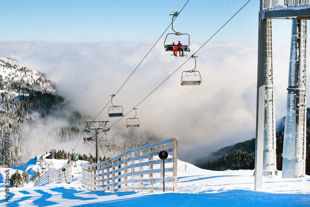 Ski resort Kopaonik, Serbia, lift, mountain view, fog Ski resort Kopaonik, Serbia, lift, mountain view, fog