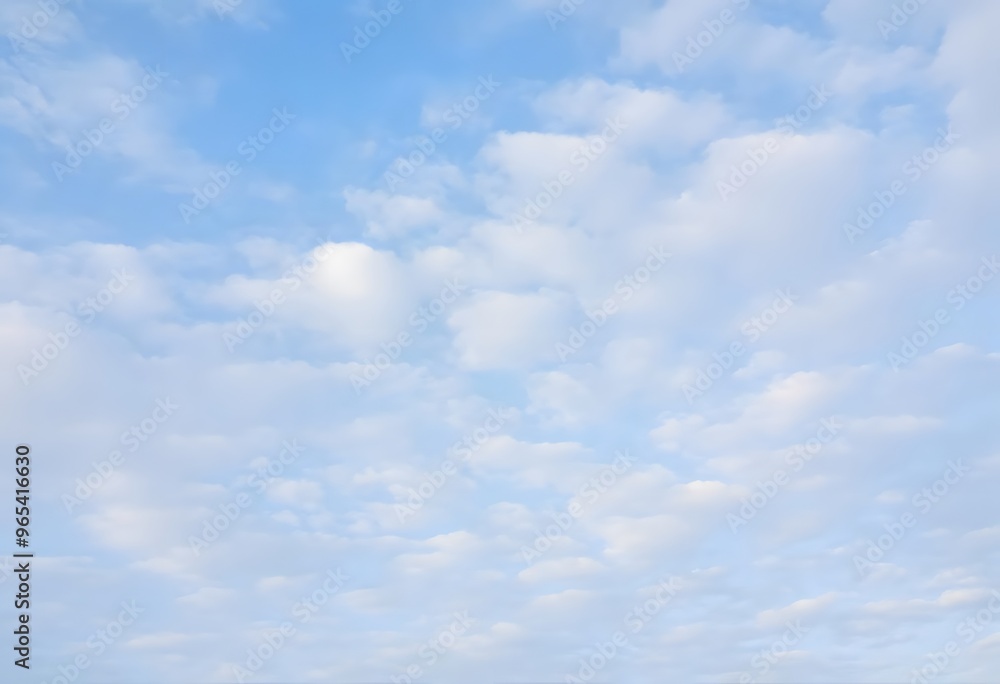 Clear blue sky with a single, fluffy white cloud drifting across it Clear blue sky with a single, fluffy white cloud drifting across it