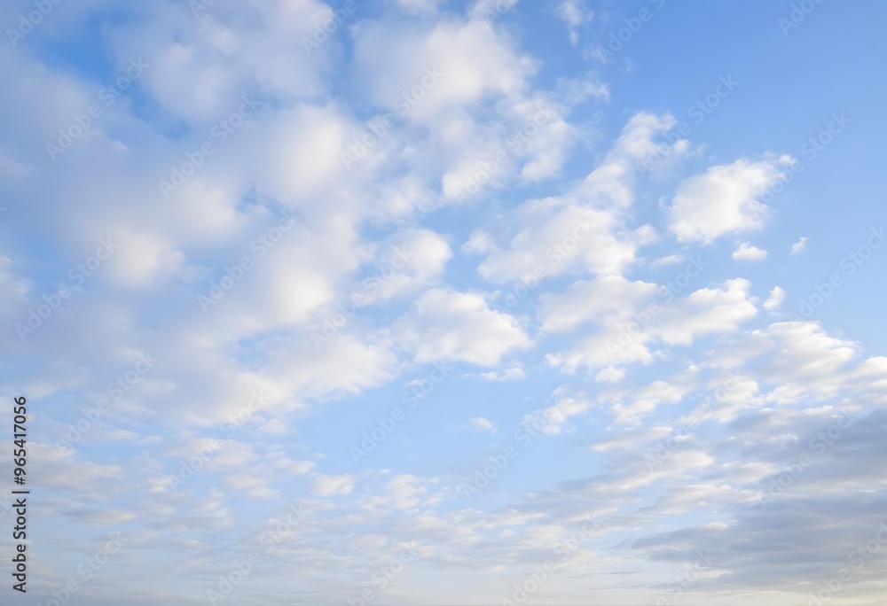 Obraz premium Clear blue sky with a single, fluffy white cloud drifting across it