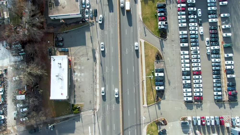 Main Roads And Traffic Over Cityscape Of Plainfield In Union County, New Jersey, United States. Aerial Tilt-up Shot Main Roads And Traffic Over Cityscape Of Plainfield In Union County, New Jersey, United States. Aerial Tilt-up Shot