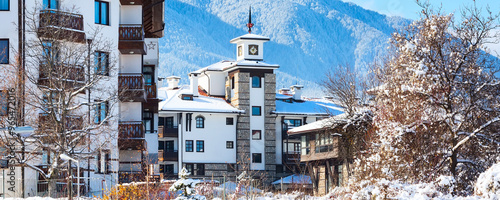 Houses and snow mountains panorama in Bansko, Bulgaria