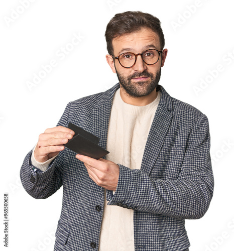 Принти на полотні Hispanic male businessman holding wallet in studio