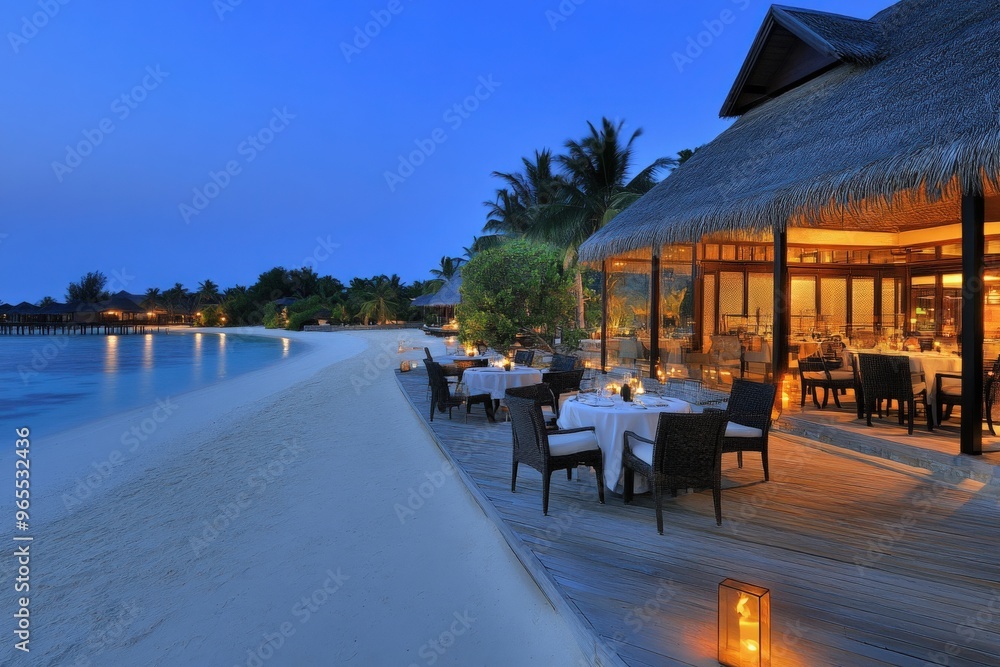 Soft waves roll gently onto the sandy shore, where an exquisite dining setup awaits. Lanterns light the path as couples savor a romantic dinner surrounded by lush palm trees and tranquil waters. Soft waves roll gently onto the sandy shore, where an exquisite dining setup awaits. Lanterns light the path as couples savor a romantic dinner surrounded by lush palm trees and tranquil waters.