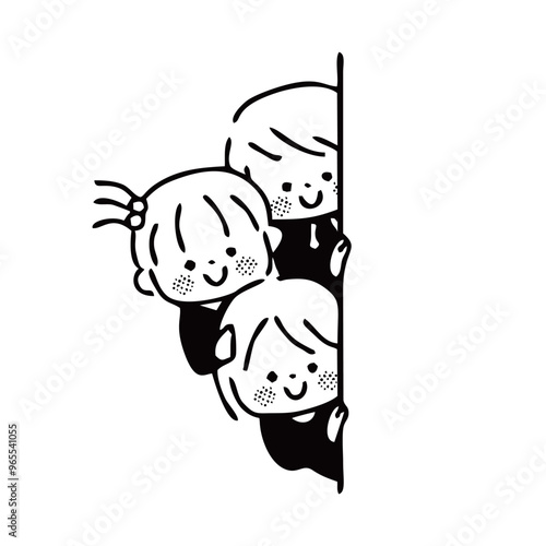 壁から覗いている子供　笑顔