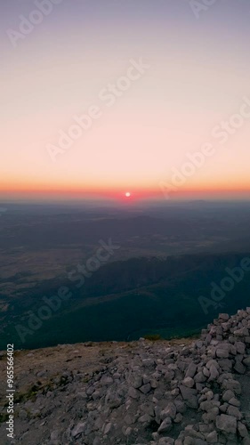 Rtanj mountain. Aerial view of the first rays of the rising sun above highest mountain peak Siljak. photo