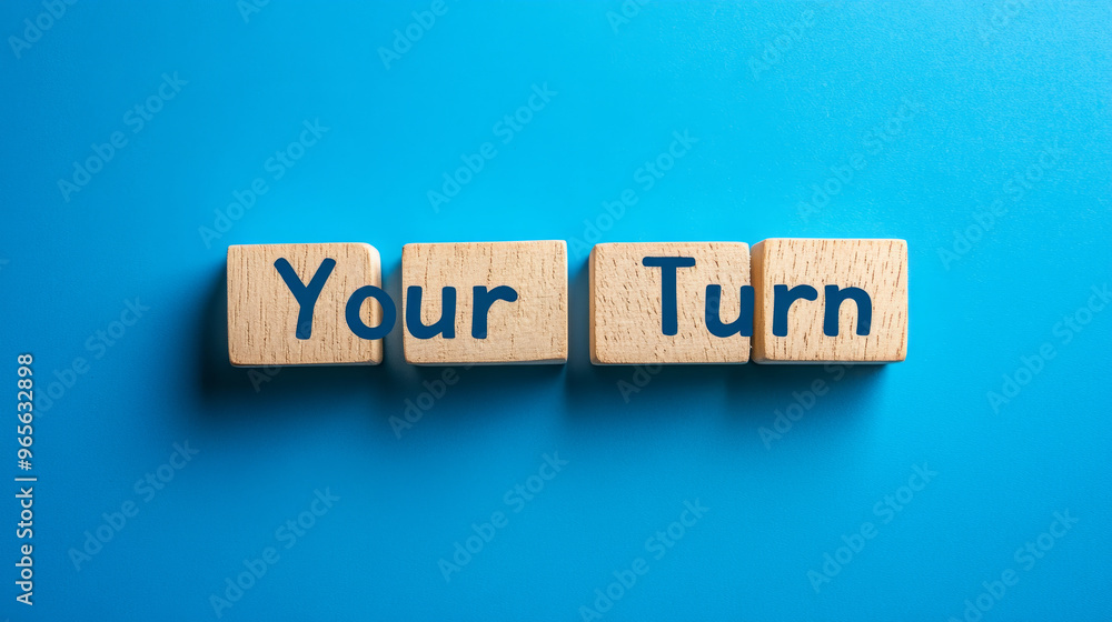 It's your turn! Wooden blocks spell out It's your turn! Wooden blocks spell out