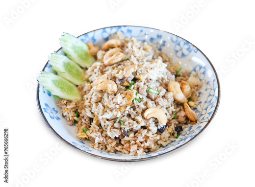 Top view of Chinese Olives Fried Rice topping with Cashew nuts, focus selective photo