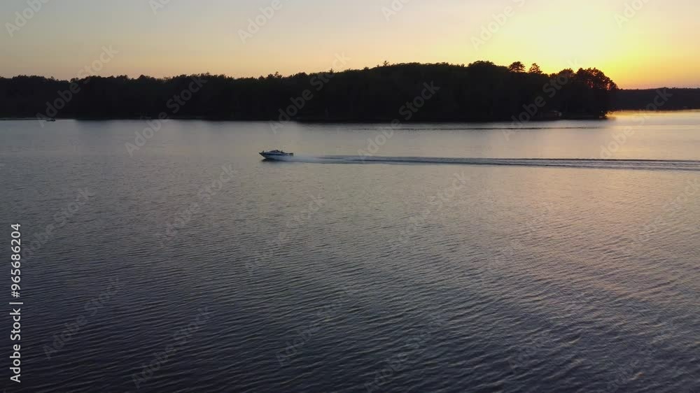 A serene drone video of Upper Buckatabon Lake, capturing its pristine waters, lush surrounding forests, and tranquil atmosphere
A serene drone video of Upper Buckatabon Lake, capturing its pristine waters, lush surrounding forests, and tranquil atmosphere