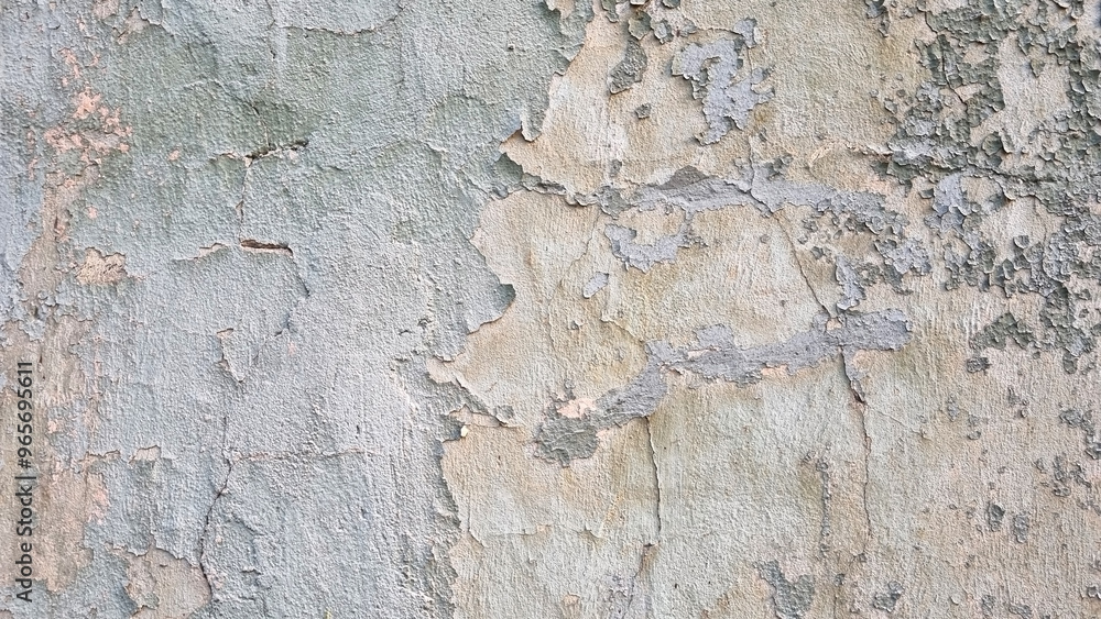Peeling paint on an old wall. Grunge background for design.Selective focus Peeling paint on an old wall. Grunge background for design.Selective focus