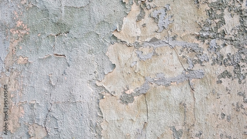 Peeling paint on an old wall. Grunge background for design.Selective focus