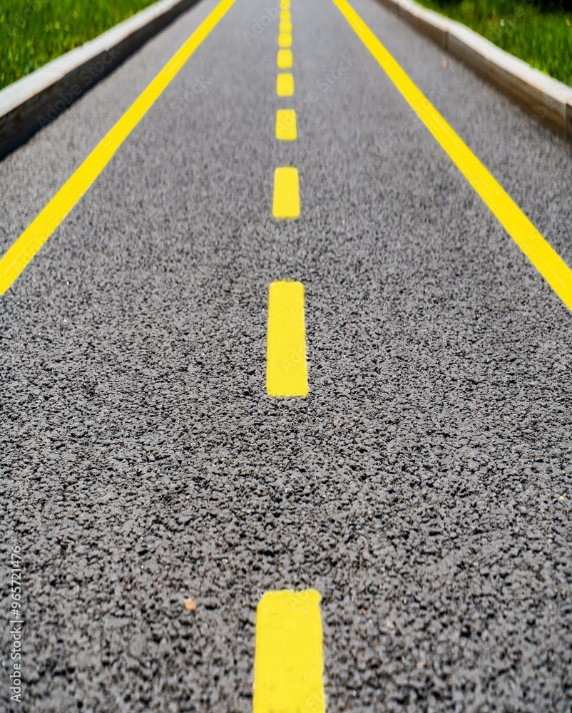 road markings asphalt yellow lines for highway labels close up road markings asphalt yellow lines for highway labels close up