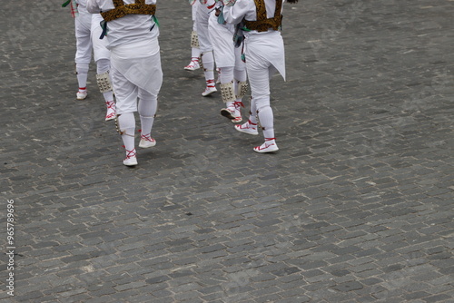 Basque folk dancers during a performance in an outdoor festival