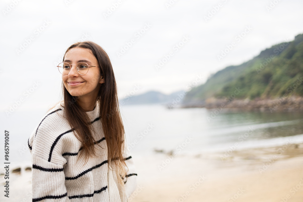 Young woman enjoying coastal views in Asturias, Spain Young woman enjoying coastal views in Asturias, Spain