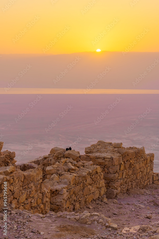 Sunrise view of the ruins of Masada Fortress