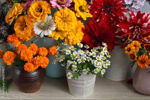 Wallpaper Mural garden flowers in vases in a row on a shelf or table. a collection of different bouquets. a flower showcase. background, backdrop, texture. Torontodigital.ca