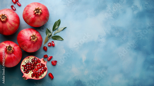 Pomegranate fruit, pink background, Rosh hashanah, jewish new year holiday, traditional food for celebration  photo